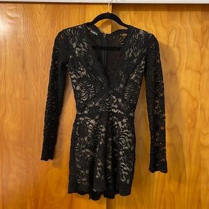 Bebe Deep V lace Romper longe sleeve.